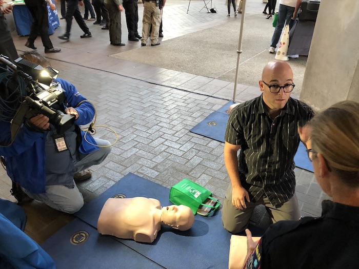 Cameron Barrett demos hands-only CPR during the great shakeout