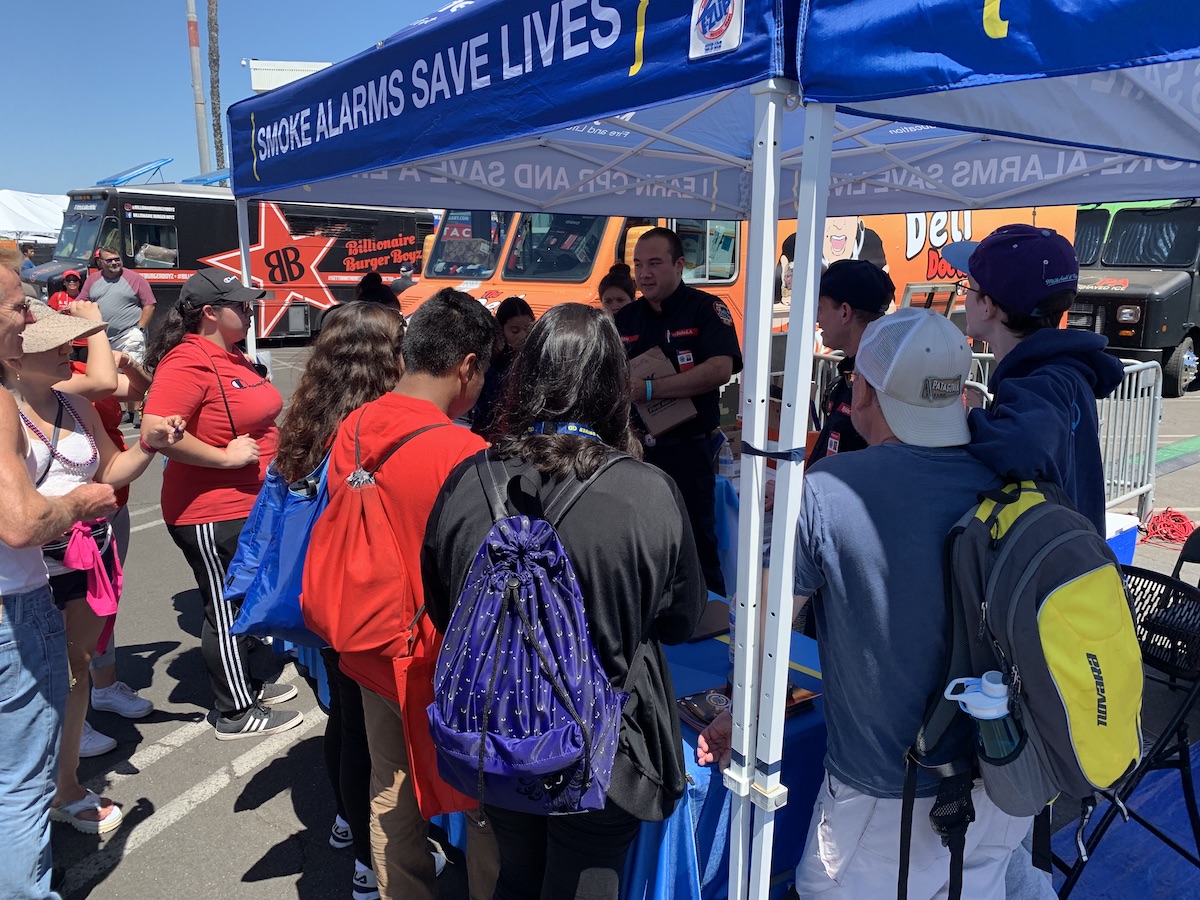 People crowd the display of MySafe:LA's booth at Fleet Week 2019